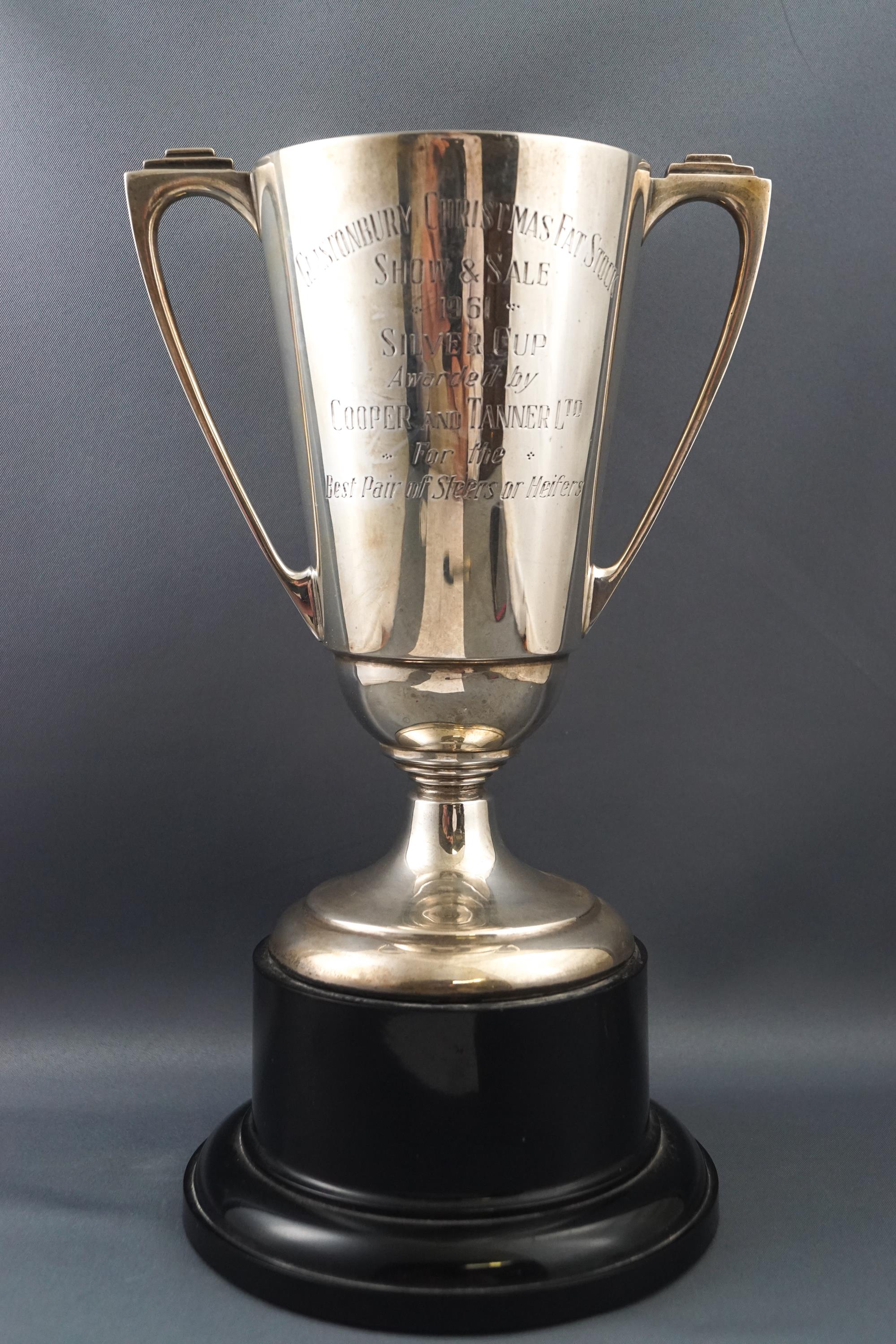 An Art Deco Glastonbury Christmas Fat Stock Show and Sale two handled trophy cup, dated 1961, 17.