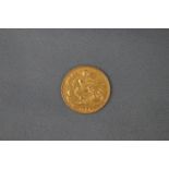 A 22ct yellow gold half sovereign loose coin. Dated 1903. 4.
