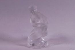 A Lalique glass figure of a kneeling girl with a lamb, labels to underside,