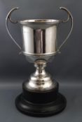 A silver two handled trophy cup, 20.