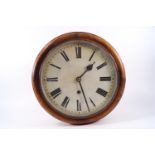 An early 20th century oak cased dial clock,