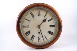 An early 20th century oak cased dial clock,