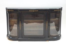 A Victorian ebonised mirror back side cabinet of bow ended breakfront form,