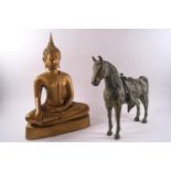 A Chinese bronze model of a horse with verdigris finish, 24cm high x 28cm across,