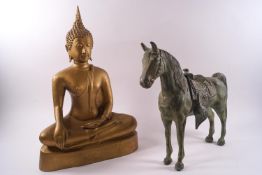 A Chinese bronze model of a horse with verdigris finish, 24cm high x 28cm across,