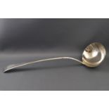A George III silver Old English pattern soup ladle engraved with a family crest,
