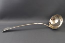 A George III silver Old English pattern soup ladle engraved with a family crest,