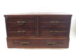 An Edwardian mahogany table top chest of five drawers by Maple & Co, stamped to bottom drawer,