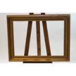 A gilt picture frame, inner size 46cm x 35.