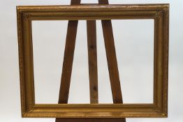 A gilt picture frame, inner size 46cm x 35.
