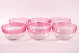 A set of six 20th century glass finger bowls, each with pink ribbed detail,12.