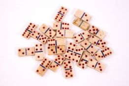 A 19th century miniature bone set of dominoes within wooden box, 5.