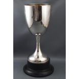 A silver trophy cup of plain form with flared foot, 23cm high, Birmingham 1922, 312 grams,
