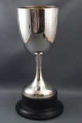 A silver trophy cup of plain form with flared foot, 23cm high, Birmingham 1922, 312 grams,