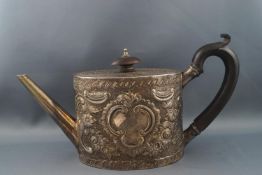 A George III silver teapot, with fruitwood handle and knop,