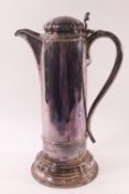 An Elkington & Co silver plated tankard, with hinged cover,