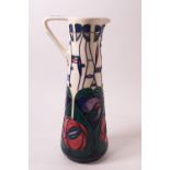 A Moorcroft Pottery slender jug in the Macintosh Rose pattern, painted and printed factory marks,
