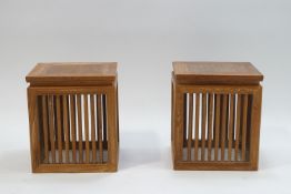A pair of modern teak occasional tables, 40cm high x 35.5cm x 35.