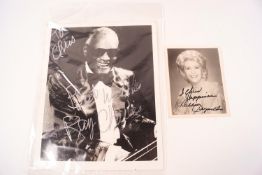 A photograph of Ray Charles, dedicated and signed by him, 25.5cm x 20.