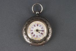 A ladies silver open face pocket watch with white ceramic dial having red Roman numerals and gold