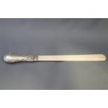An Edwardian ivory and silver handled letter opener, 21.