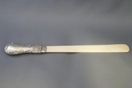 An Edwardian ivory and silver handled letter opener, 21.