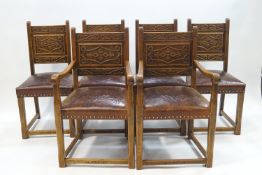 A set of six modern carved oak dining chairs, the backs decoratively carved to both sides,