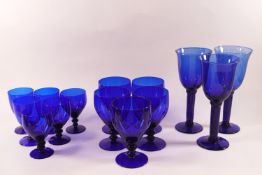 Bristol blue glass: a set of five goblets, 14cm high, a set of three,