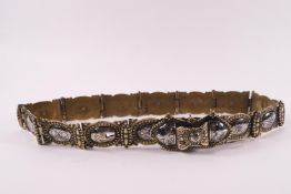 A Middle Eastern ladies polished brass belt,