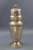 A silver sugar caster, Sheffield 1950 by Walker & Hall, 16.