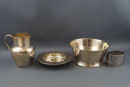 A Mappin & Webb silver cream jug, London 1902, a Mappin & Webb silver Armada dish, London 1975,