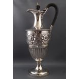A Victorian silver claret jug by Edward Hutton for William Hutton and Sons,