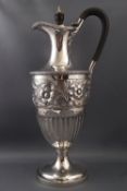 A Victorian silver claret jug by Edward Hutton for William Hutton and Sons,