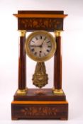 A 19th century rosewood Portico clock in the Empire style with box wood line and floral inlays,