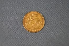 A 22ct yellow gold half sovereign loose coin. Dated 1905. 4.