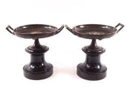 A pair of 19th century two handled bronze tazza inset with Classical portrait roundels,