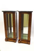 A pair of inlaid mahogany display cabinets, each with a green marble top and two shelves,