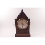 A 19th century oak cased mantel clock, the silvered dial engraved Vieyres, Pall Mall, London,