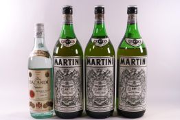 Three 1.5 litre bottles of Martini Extra Dry and a bottle of Bacardi