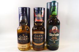 Three bottles of whisky comprising two bottles of Glen Moray whisky, 40% proof, 700ml,