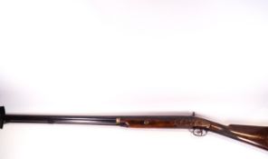 A Calderwood 9 gauge 36" barrelled percussion shotgun,