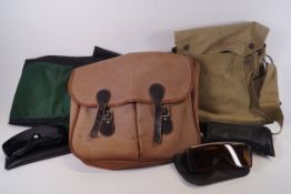 A 'Heron' fishing sleeveless jacket, two satchels,