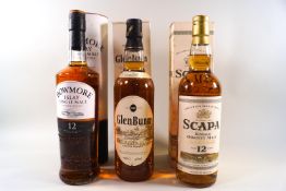 3 bottles of whisky comprising : 1 Bowmore 12 year old (700ml, 40% proof,