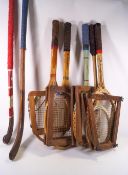 Four vintage tennis racquets, including a 1930's Woods racquet,