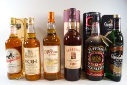 6 bottles of whisky comprising : 1 Glenfiddich (700ml, 40% proof, in tube); 1 Harrods,