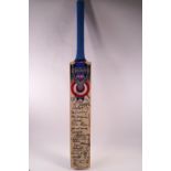 A Hampshire county signed cricket bat, including signatures from Gloucester, Surrey,