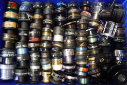 A large quantity of fishing reel spools, including Browning,