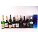 Ten bottles of assorted alcohol, including Gordon's Gin, Bristol Cream,