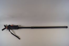 A vanguard drop down shooting stick