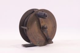 An early 20th century brass fishing reel